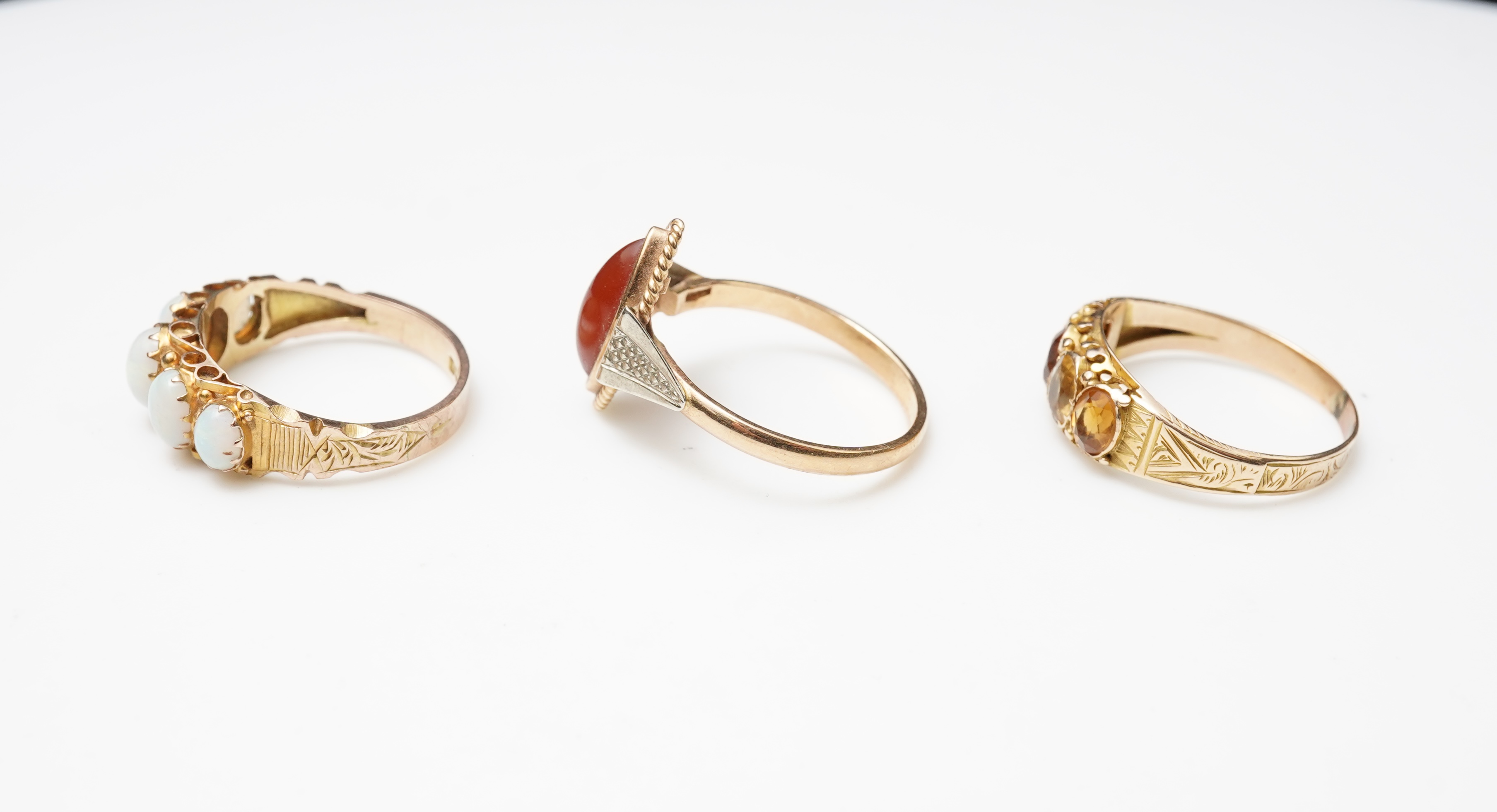 Three gem-set rings